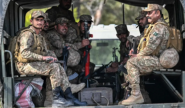 Pak army soldiers in a vehicle